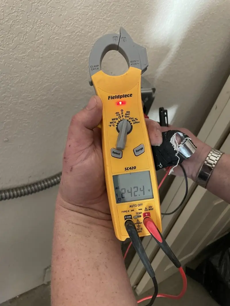 Voltage testing with clamp meter during Circuit Breaker Repair in Carlisle